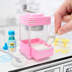 MGA's Miniverse stand mixer red for pretend batter mixing and crafts