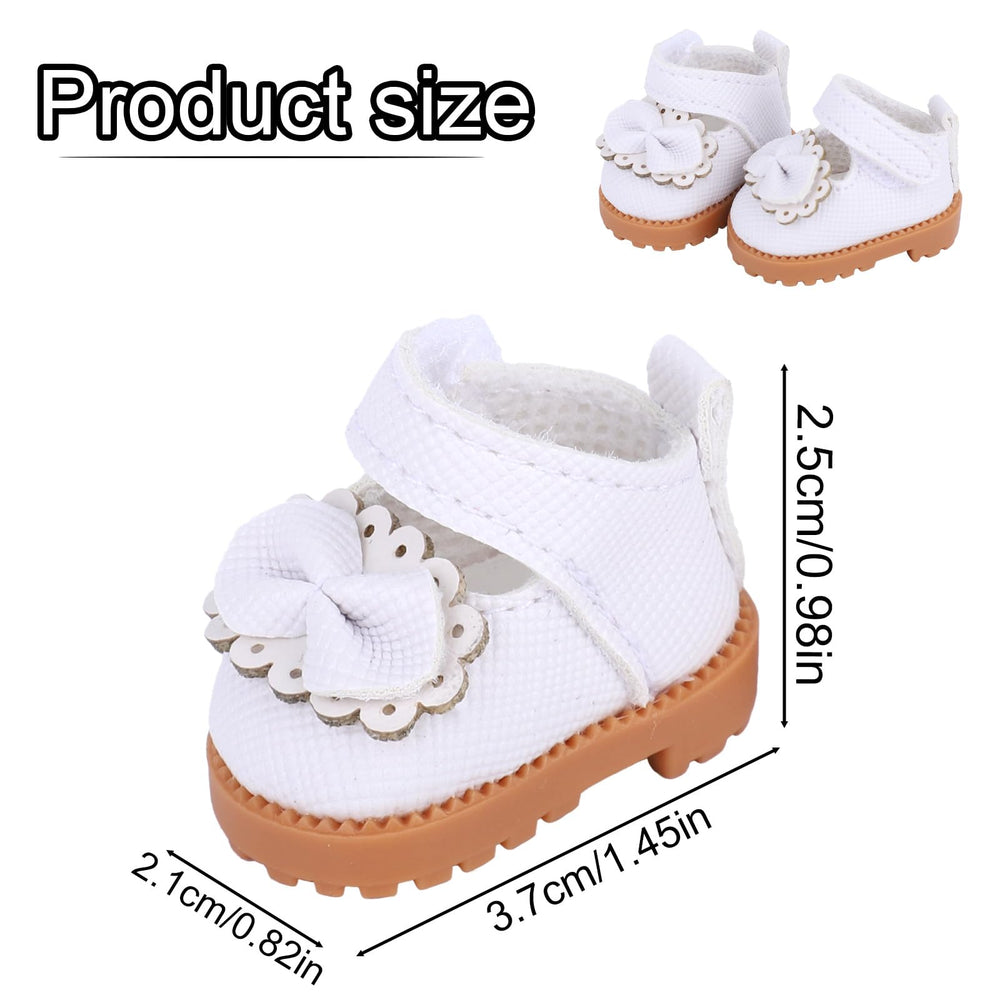 Mikovivi lace and bow detail enhances doll outfits with a delicate touch.