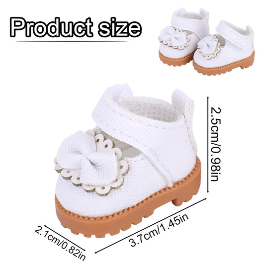 Mikovivi lace and bow detail enhances doll outfits with a delicate touch.