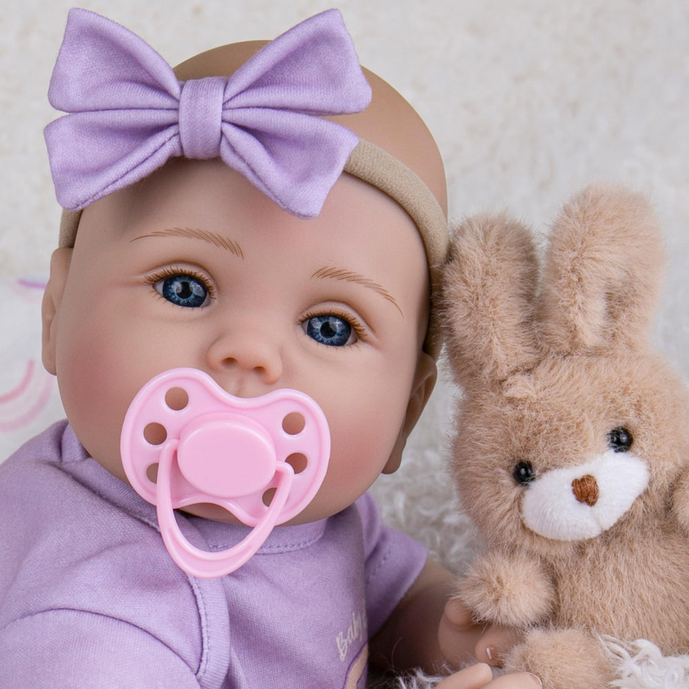 Milidool 18-inch doll fits newborn outfits for easy dress-up.