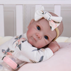 Milidool detailed hair and eyelashes, hand-painted skin texture for authentic newborn vibes.