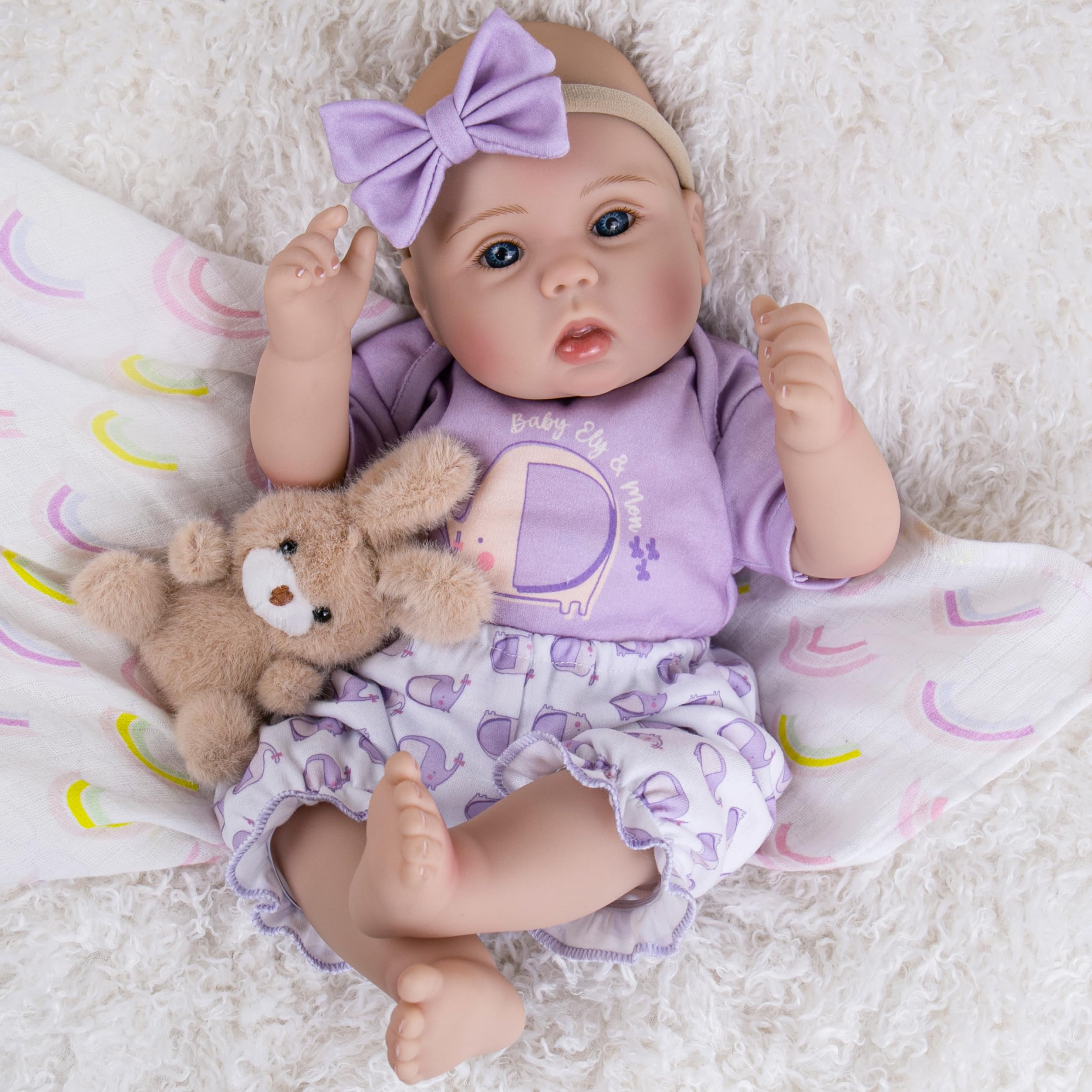 Milidool gift-set doll with clothes, bottle, and pacifier included for gifting.