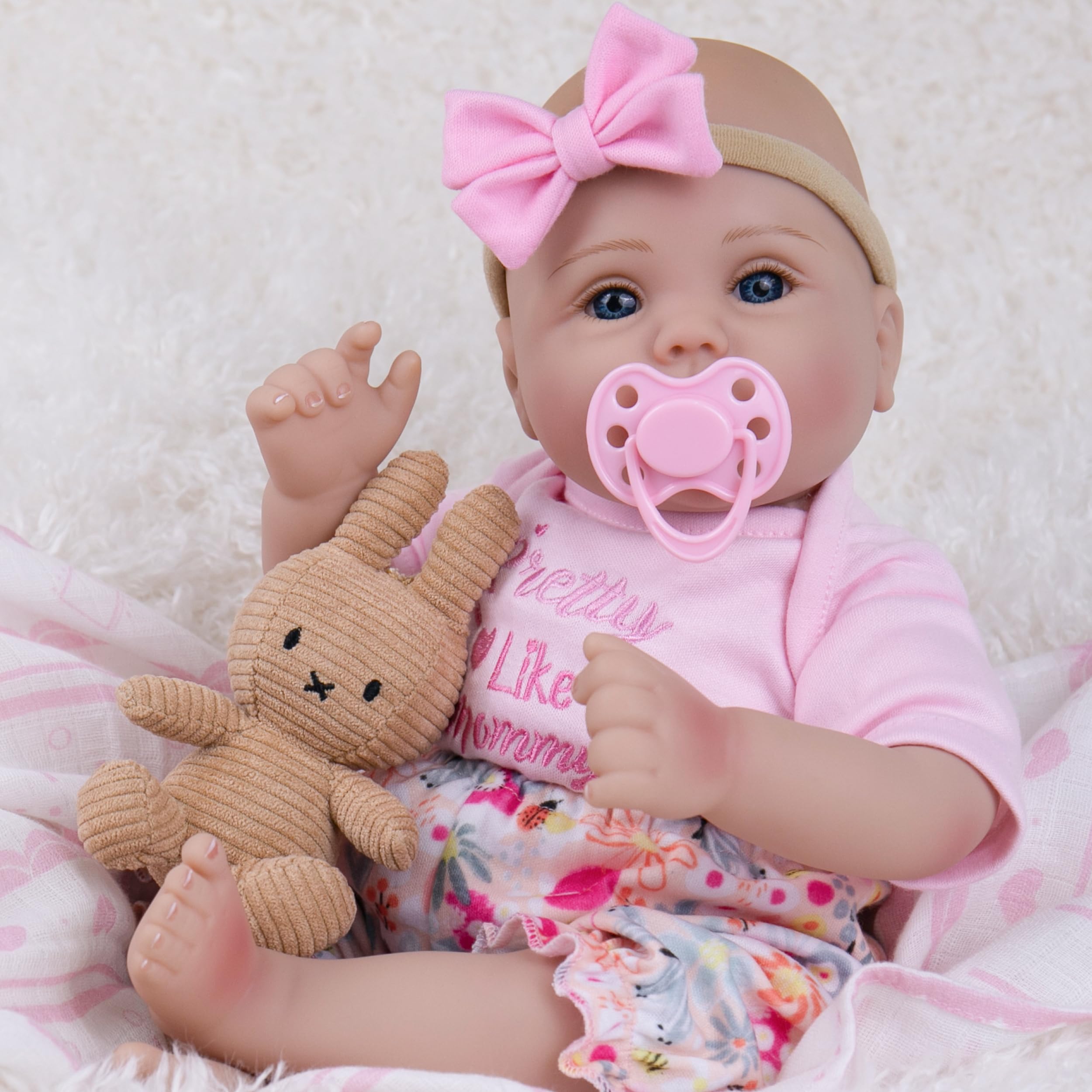 Milidool hand-painted hair and rooted eyelashes enhance authentic baby charm.