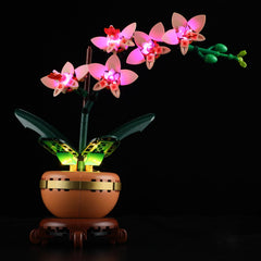 Mililier LED light kit for Lego 10343 mini orchid on display with vibrant illumination.