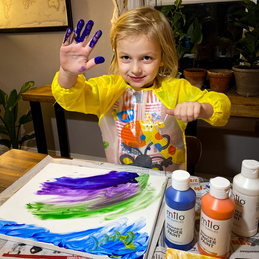 Milo 8 oz paint bottles with easy pour caps for mess-free art sessions.