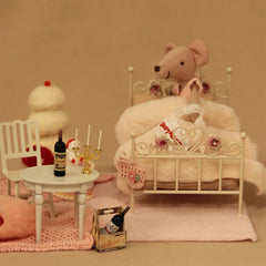 Dollhouse furniture that captures vintage-inspired charm and detailed artistry.