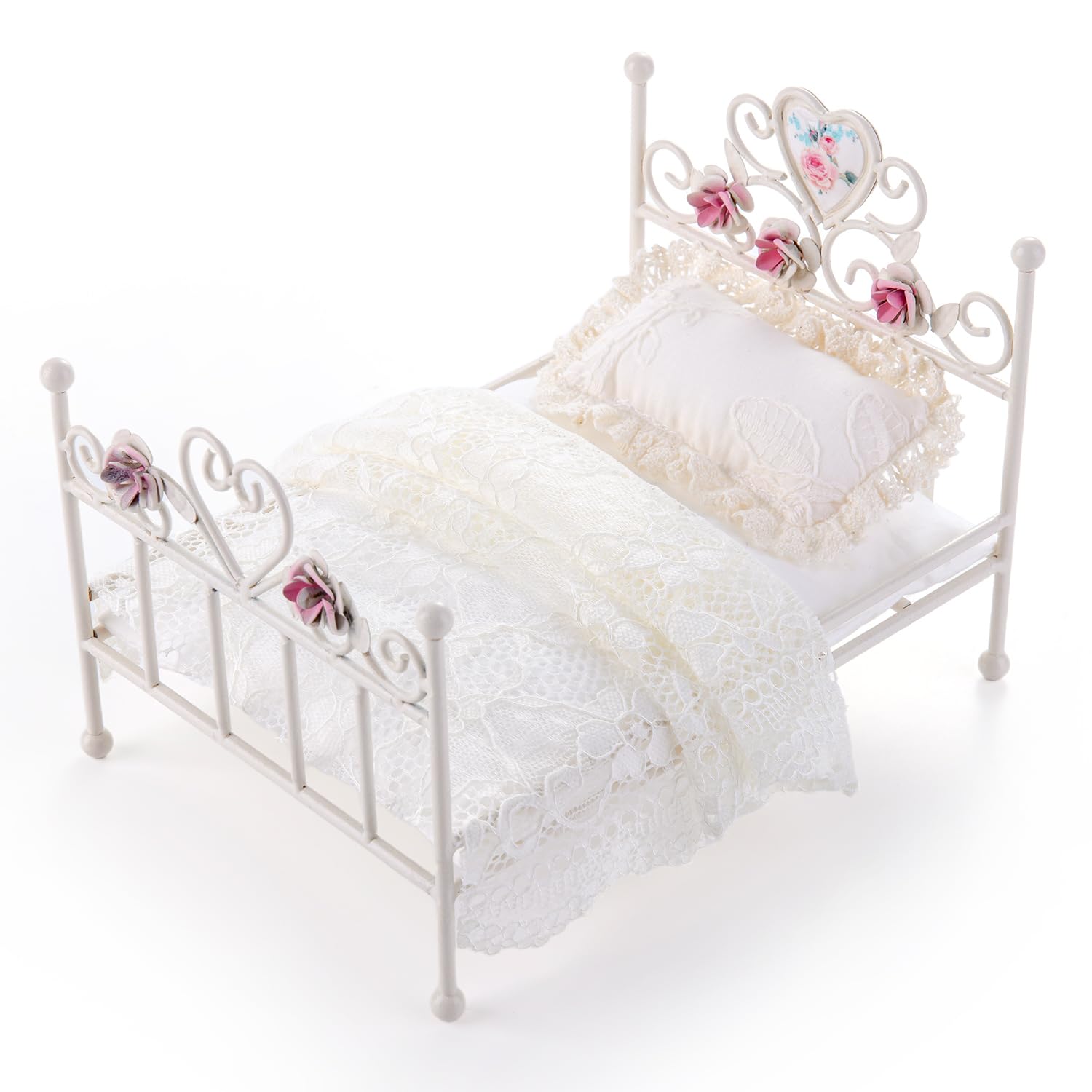 Removable bedding for Minamzee dollhouse bed enables quick scene changes.