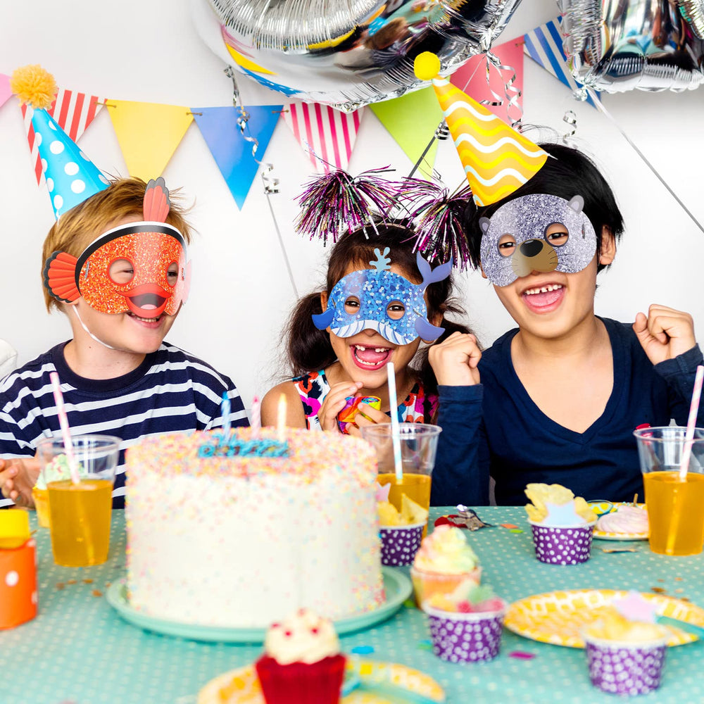 Minatee kids wearing sea animal masks for fun photo moments.