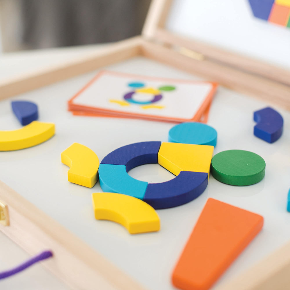 MindWare Imagination Magnets dry-erase surface invites ongoing creativity after puzzles.