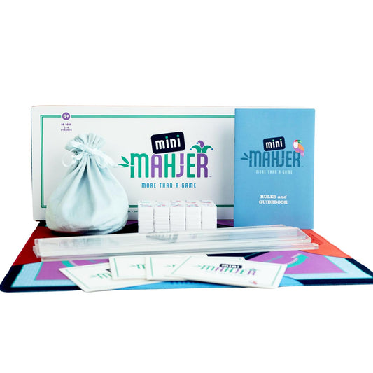 Mini Mahjer tiles on a table, inviting family play and easy learning.