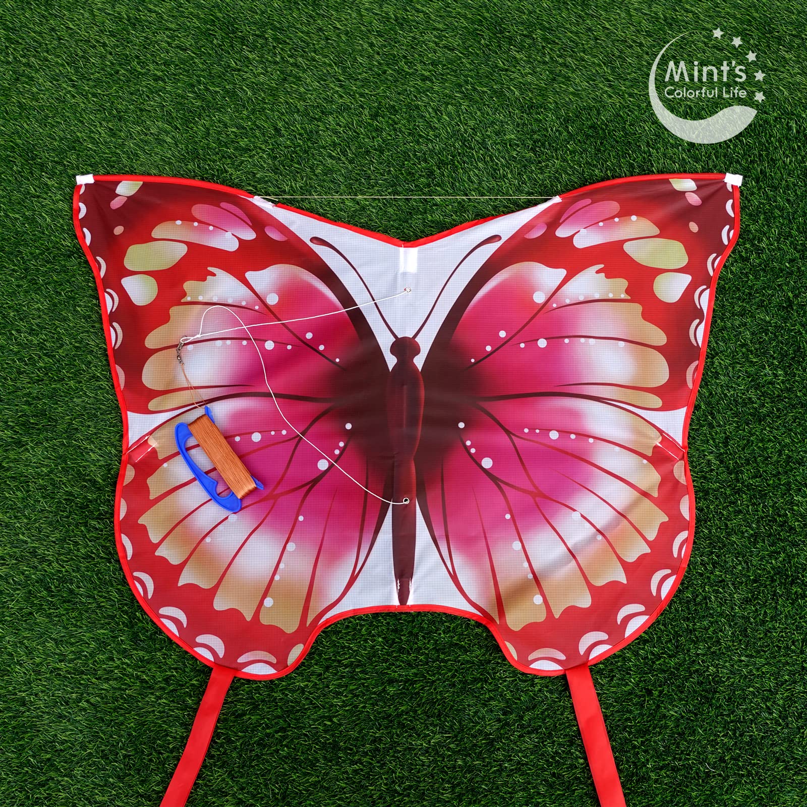 Mint's Colorful Life pink kite with 300ft line and upgraded handle.