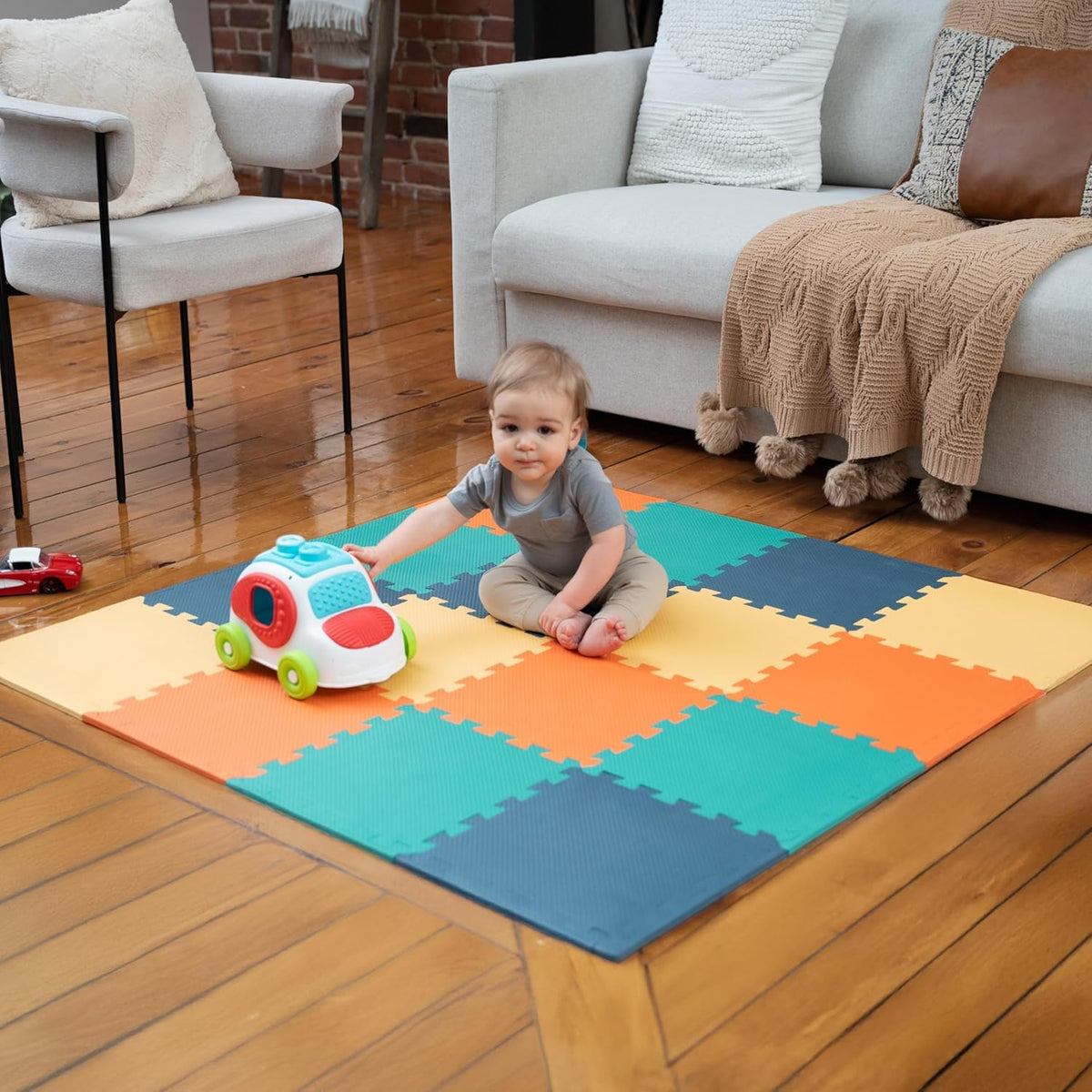 MioTetto baby play mat with interlocking tiles creates a safe crawl space.