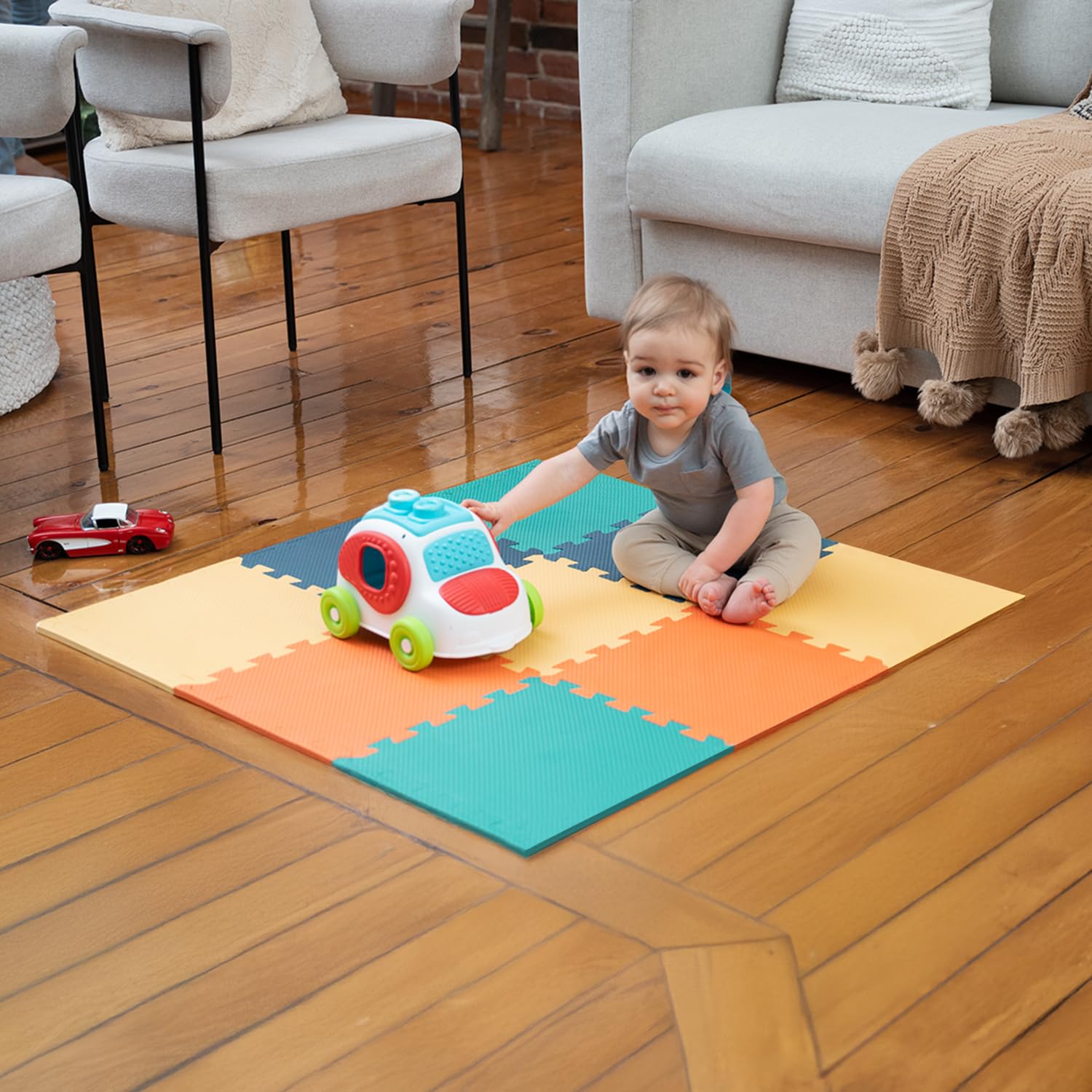MioTetto interlocking tiles form a safe crawling play space