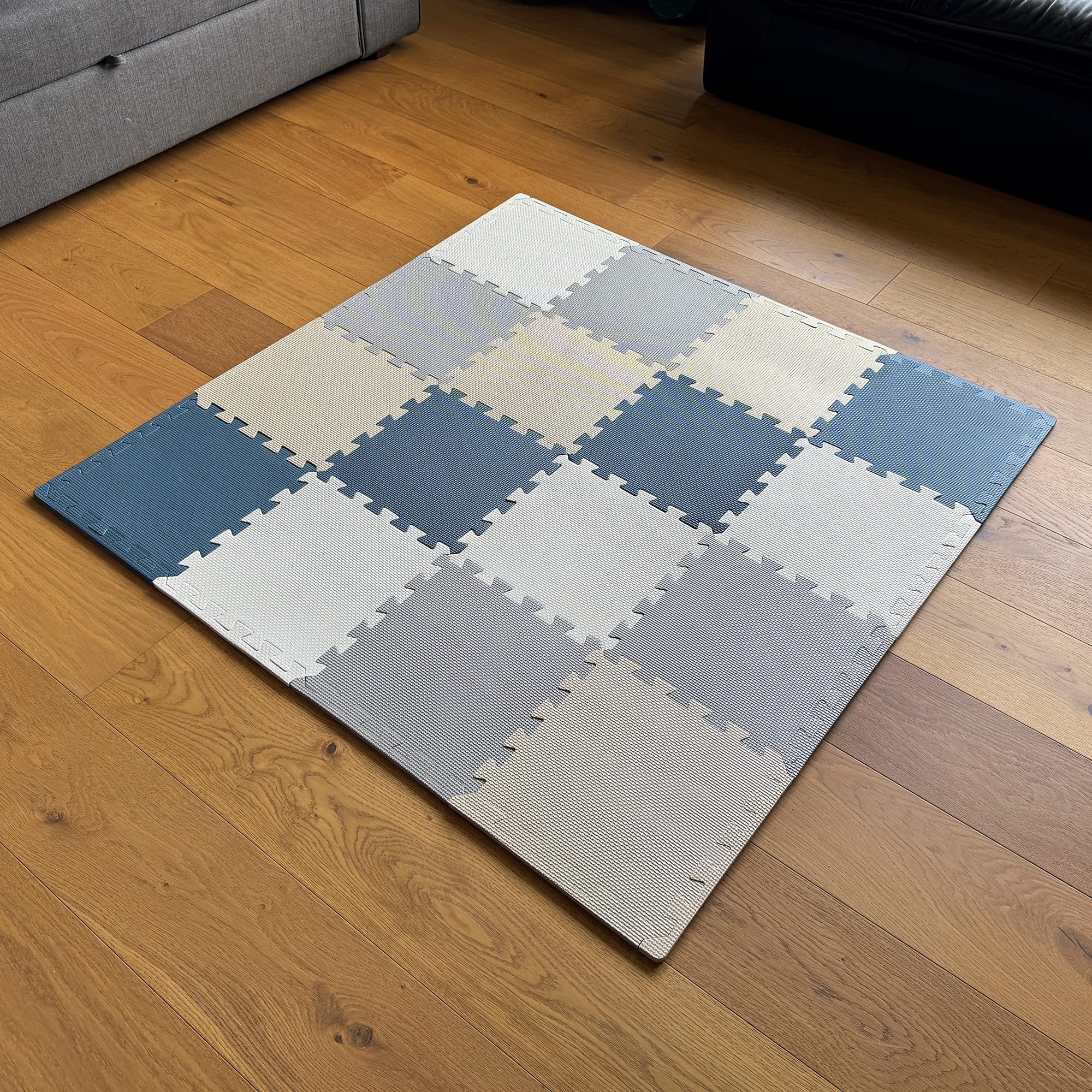 MioTetto baby play mat interlocking tiles provide a soft crawling surface.