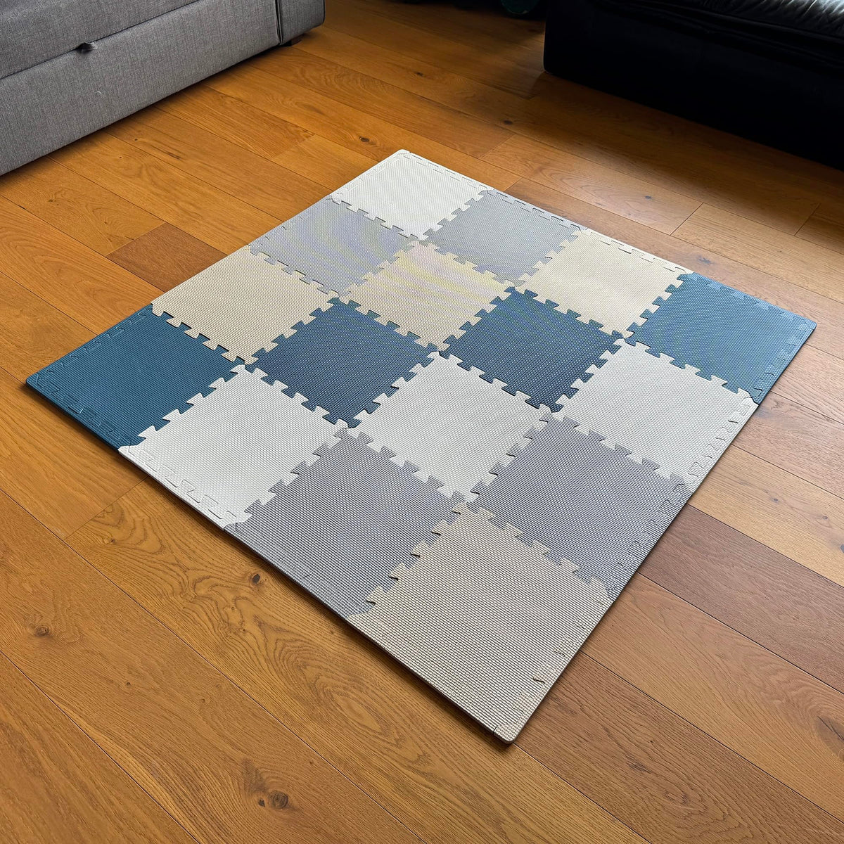 MioTetto baby play mat interlocking tiles provide a soft crawling surface.