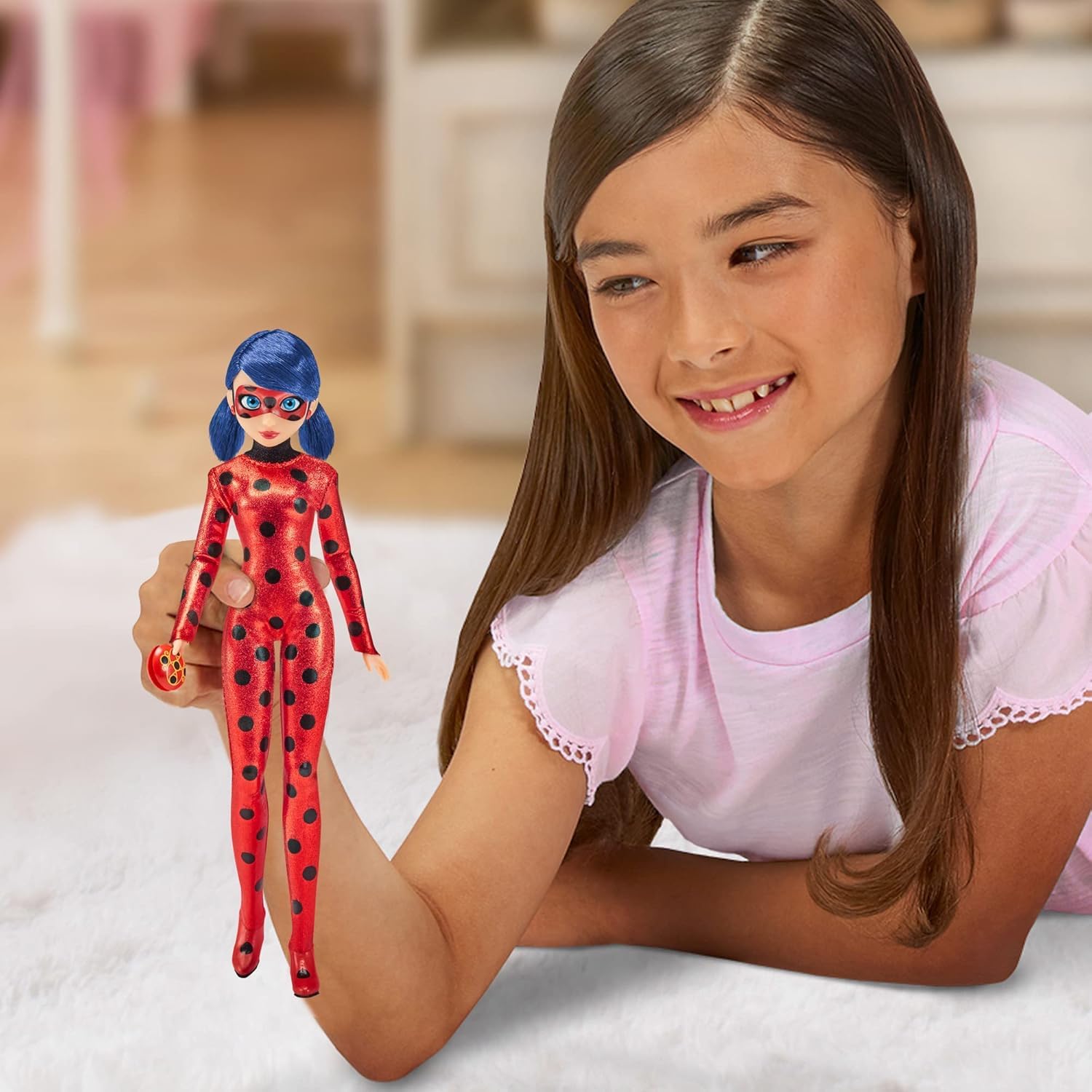 Miraculous Ladybug doll with movie yoyo accessory, authentic details for creative play.