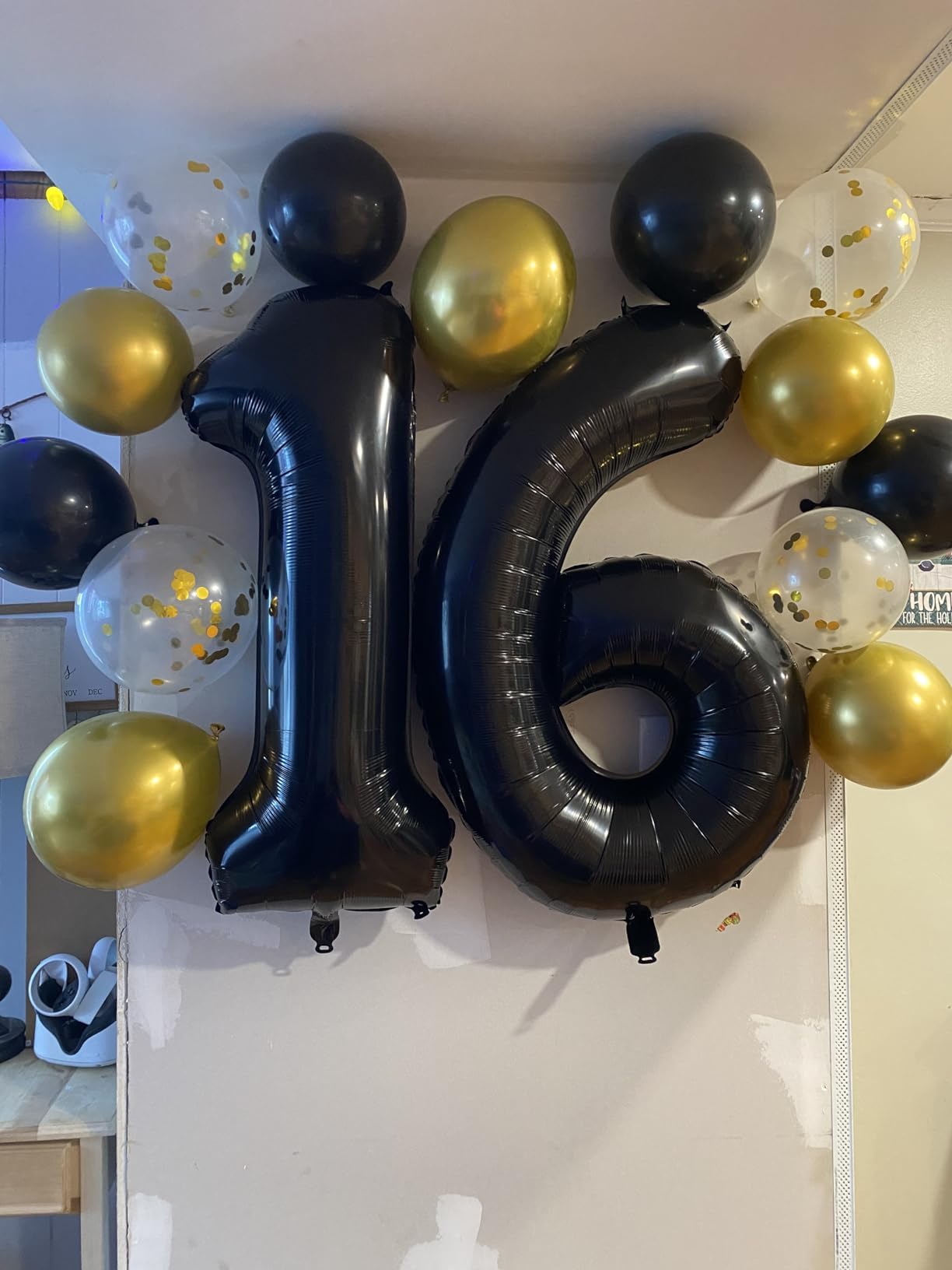 Mluchee 40-inch black number balloon 2 adds bold styling to celebrations and displays.