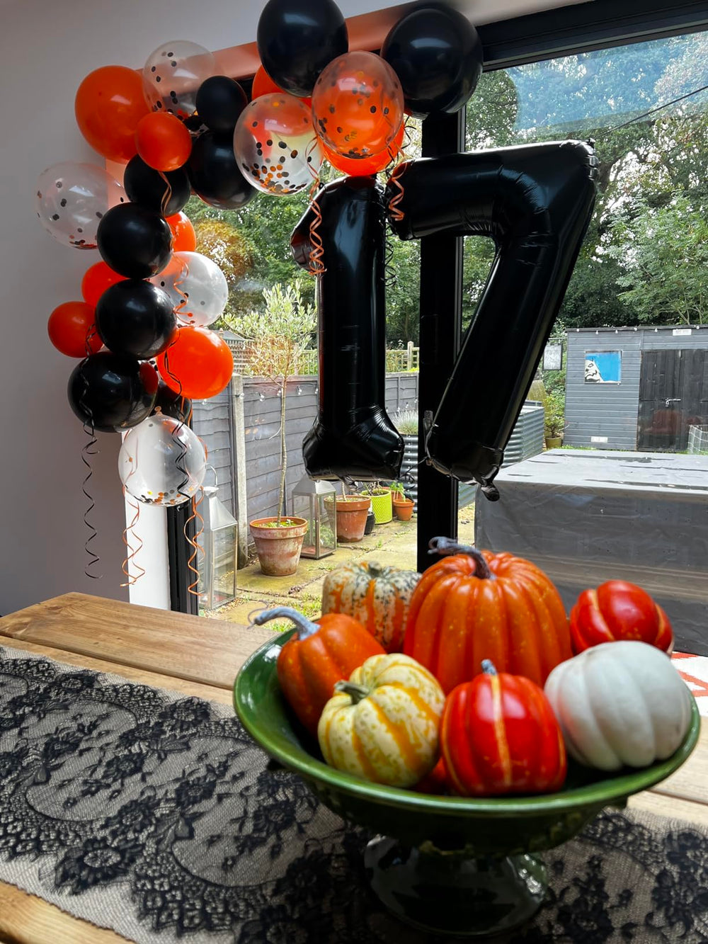 Mluchee 40-inch black number balloon 3 creates a memorable milestone backdrop.