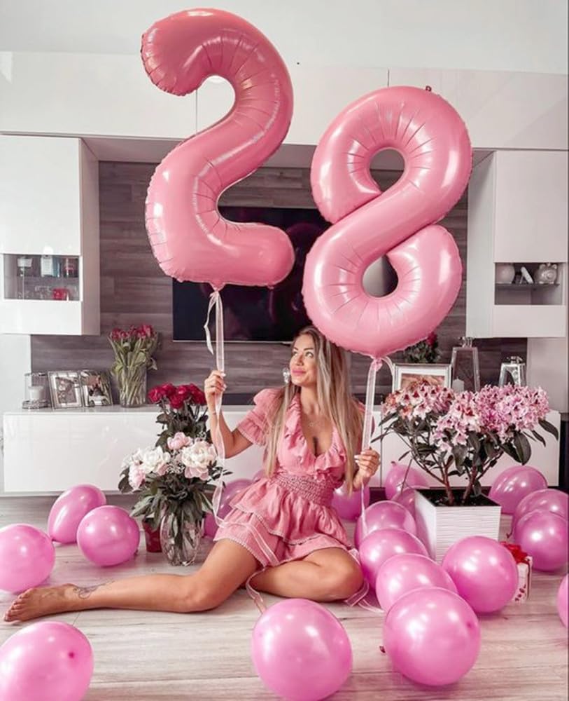 Mluchee 40-inch pink number balloon used as a photo booth prop.