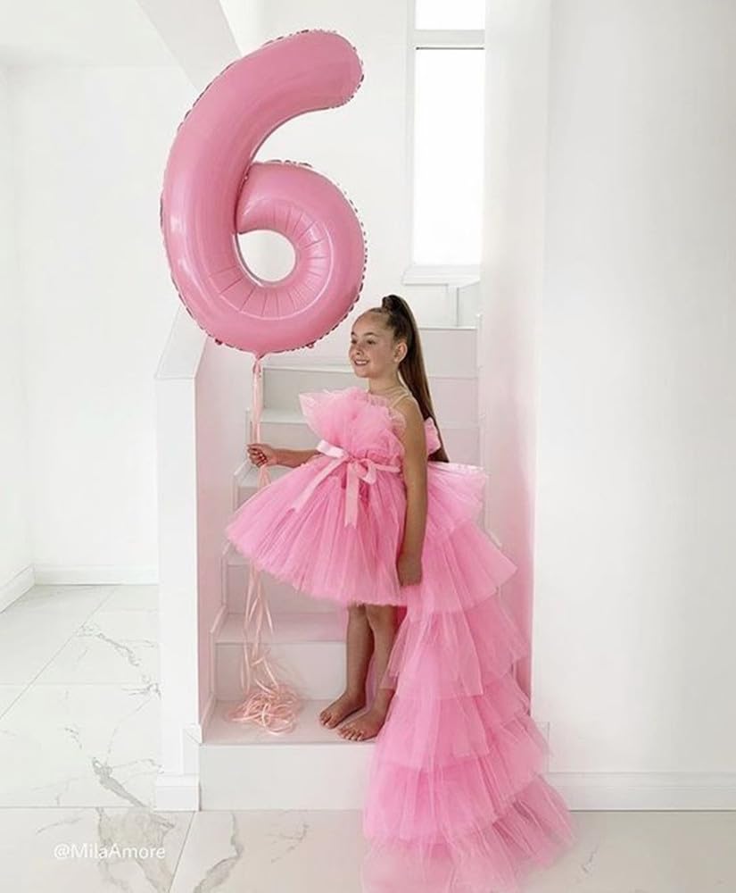 Mluchee 40-inch pink number balloon used as wall decor.