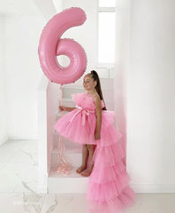 Mluchee 40-inch pink number balloon used as wall decor.