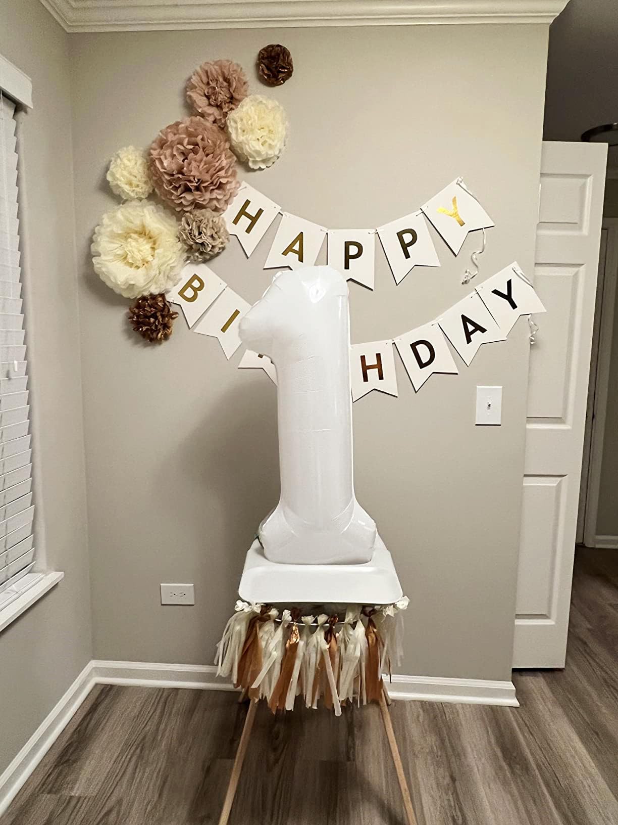 Mluchee 40inch white number balloon used as photo booth prop.