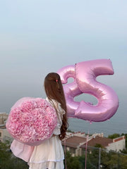 Mluchee 40-inch pearl pink number 9 balloon used at a wedding setup