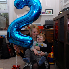 Mluchee giant number balloon enhances events with navy blue styling