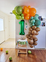 Mluchee graduation balloon provides a striking backdrop for photos