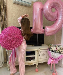 Mluchee graduation celebration with pearl pink numeric balloons
