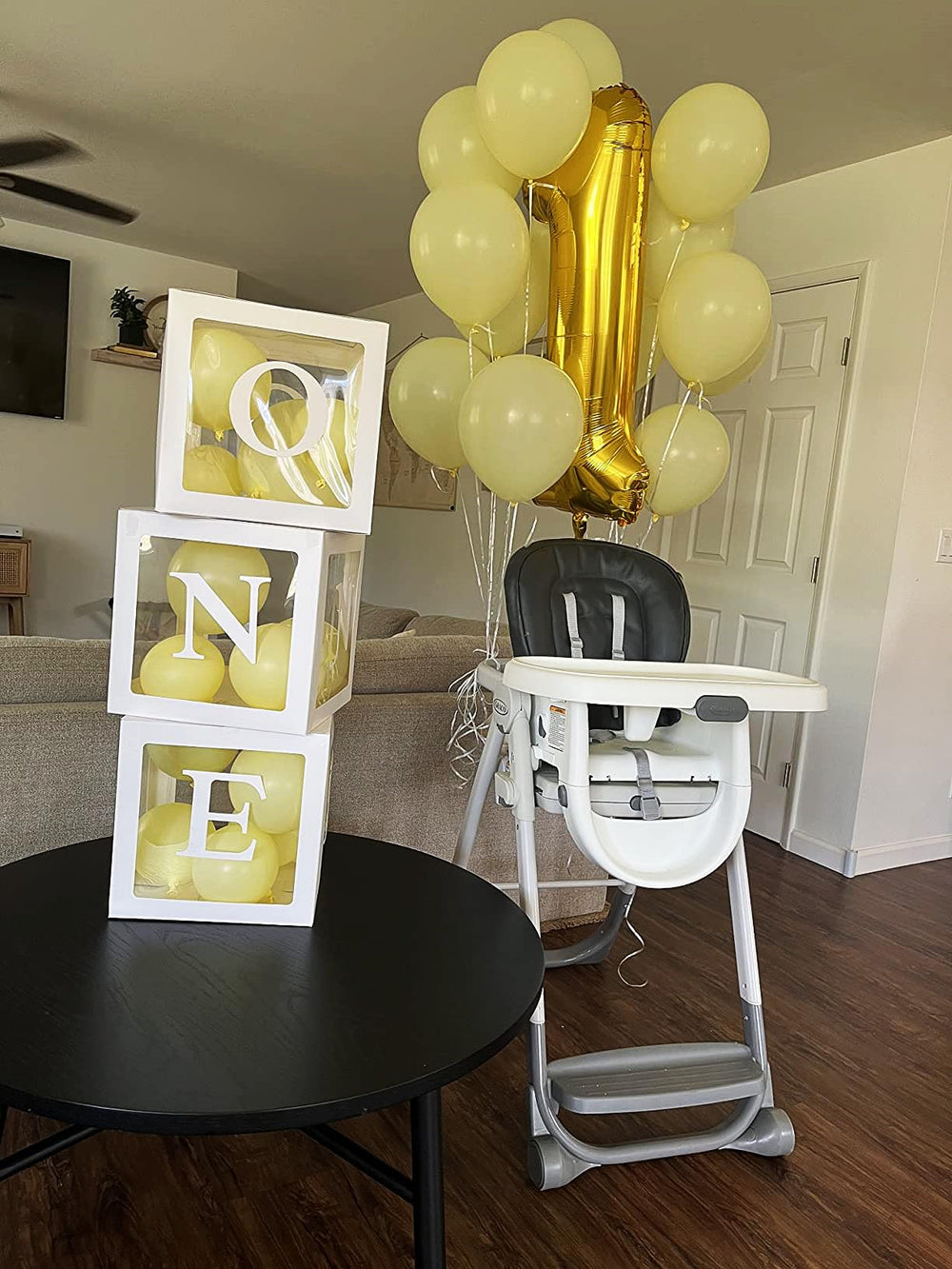 Mluchee 40-inch gold number balloon as wall decor in a party setup