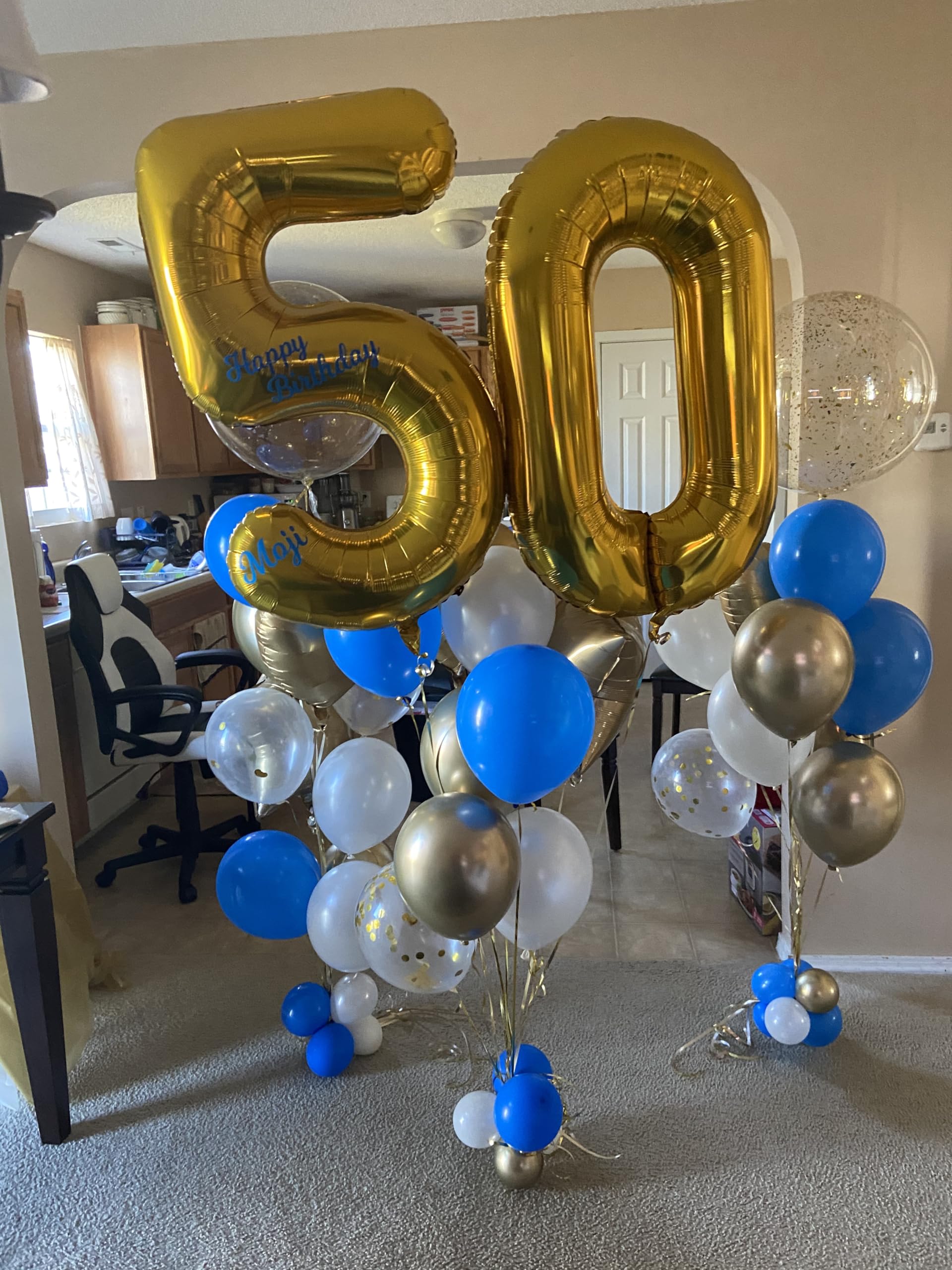 Mluchee number balloons wall display demonstrates dramatic event decor