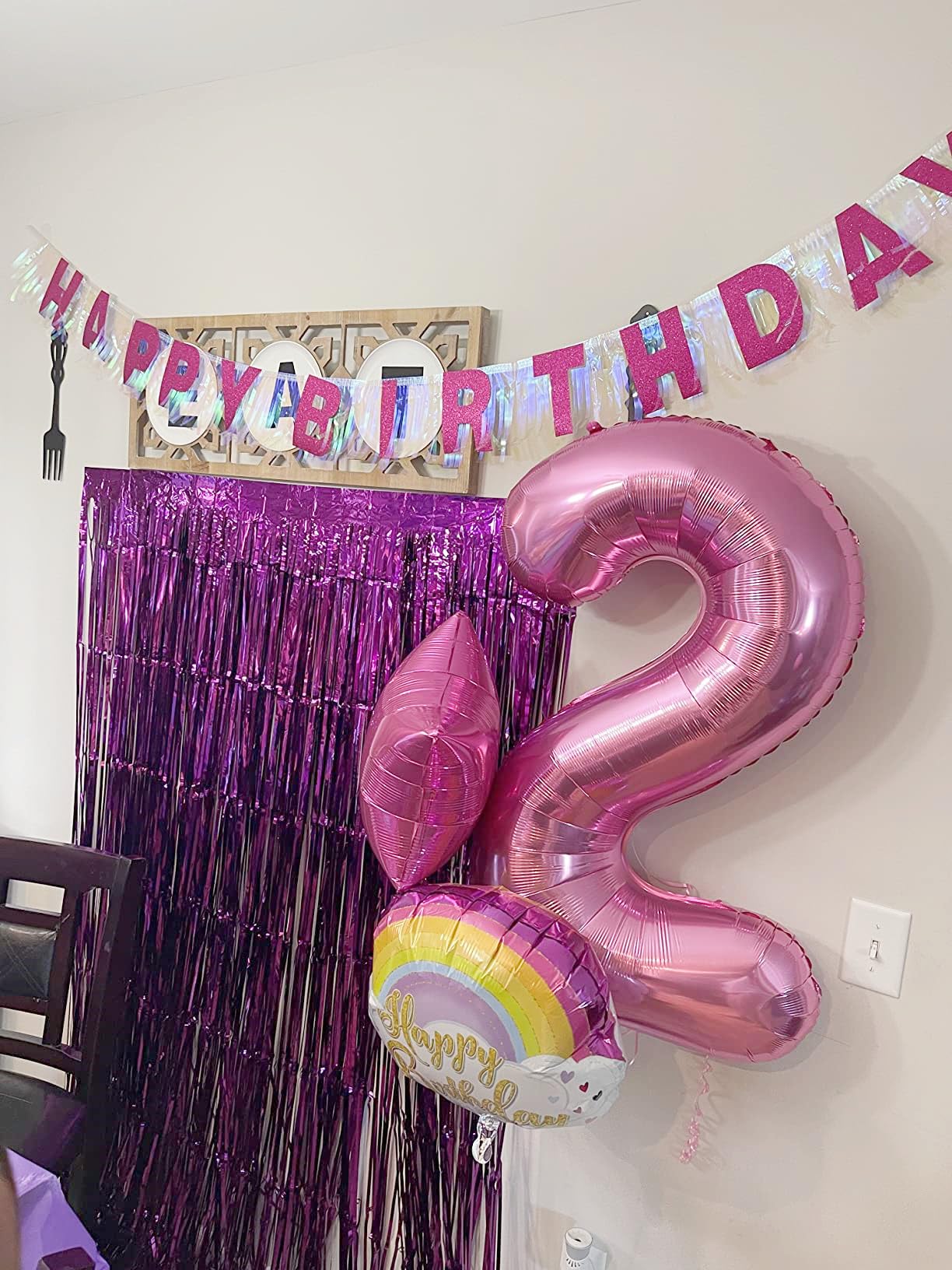 Mluchee pink 40-inch 4-number balloon arranged as a birthday display