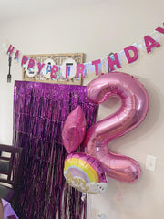 Mluchee pink 40-inch 4-number balloon arranged as a birthday display