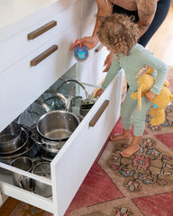 MOLLYBEE KIDS scavenger hunt card with chair, invites sit-and-respond prompts for motor play.
