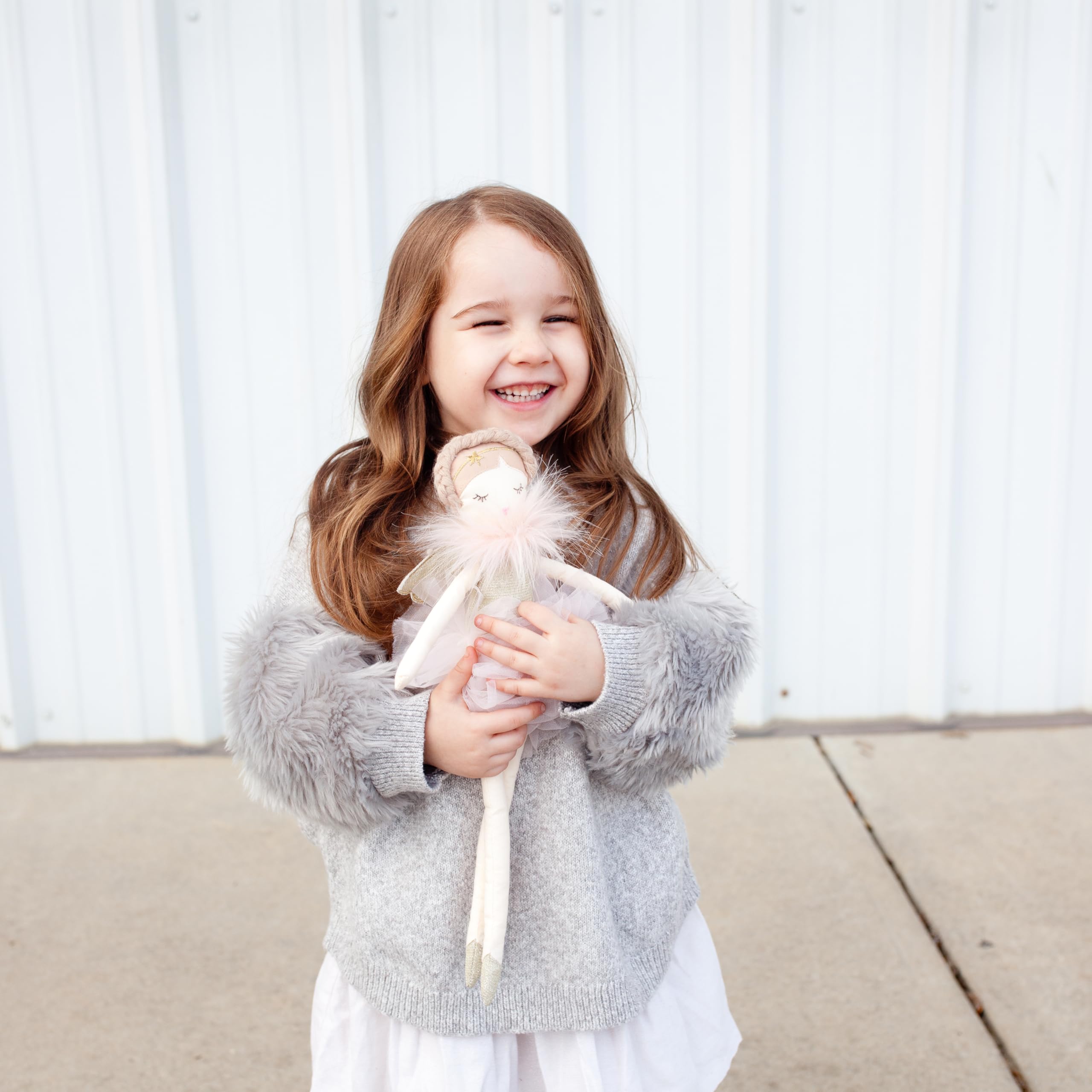 MON AMI angel doll in playtime scene encourages imaginative, gentle storytelling.