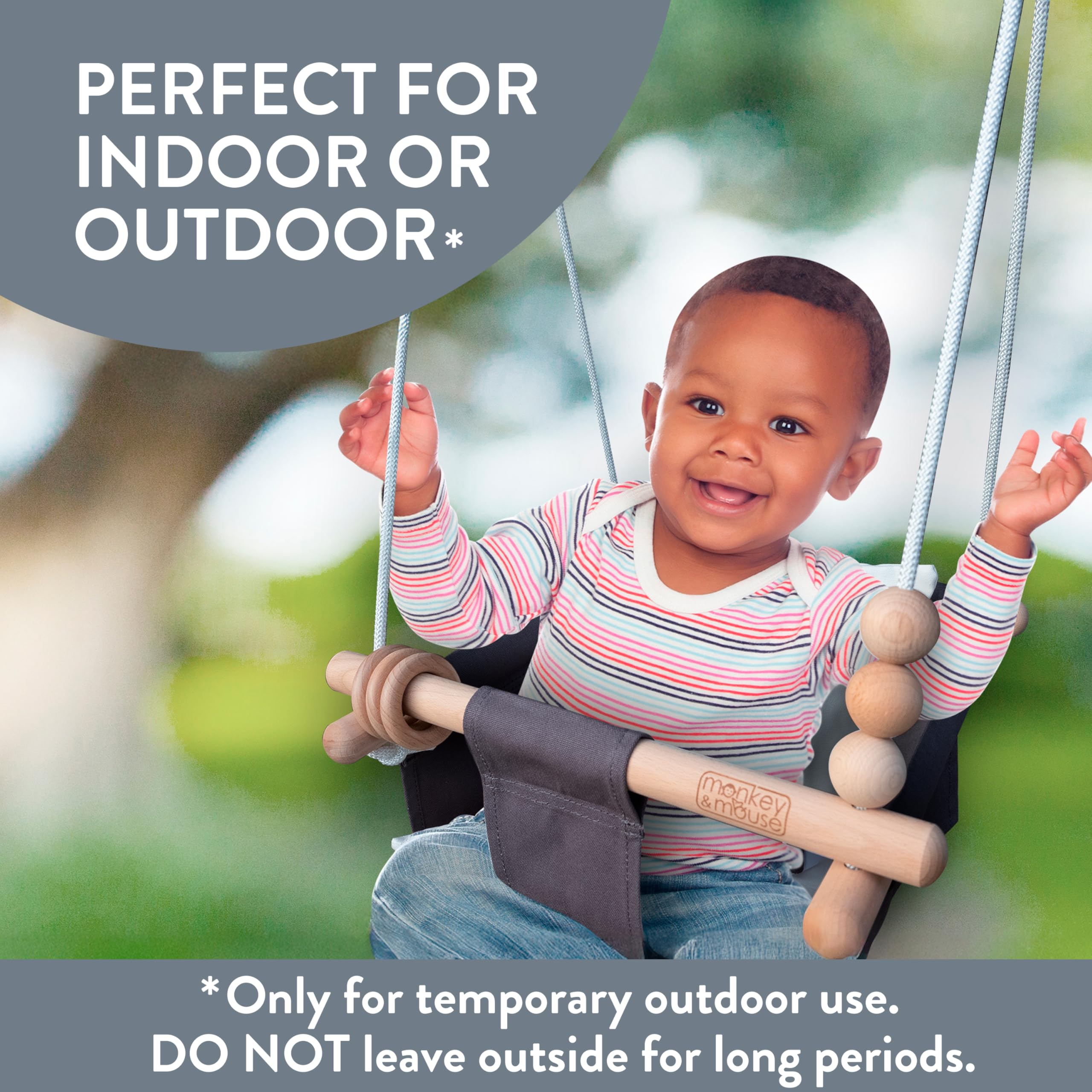 Sensory wooden toys attached to the swing rope invite grasping and exploratory play.