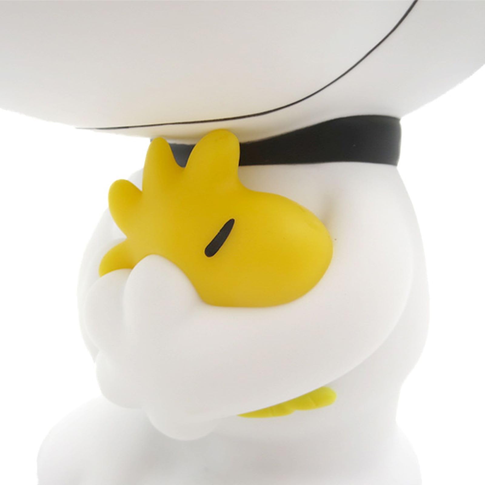 Monogram Snoopy PVC texture close-up for quality feel.