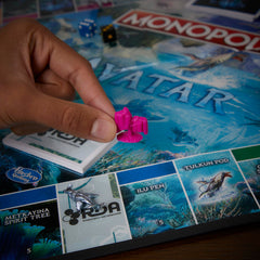 Monopoly Avatar Edition RDA Scorpion card introducing twists during play.