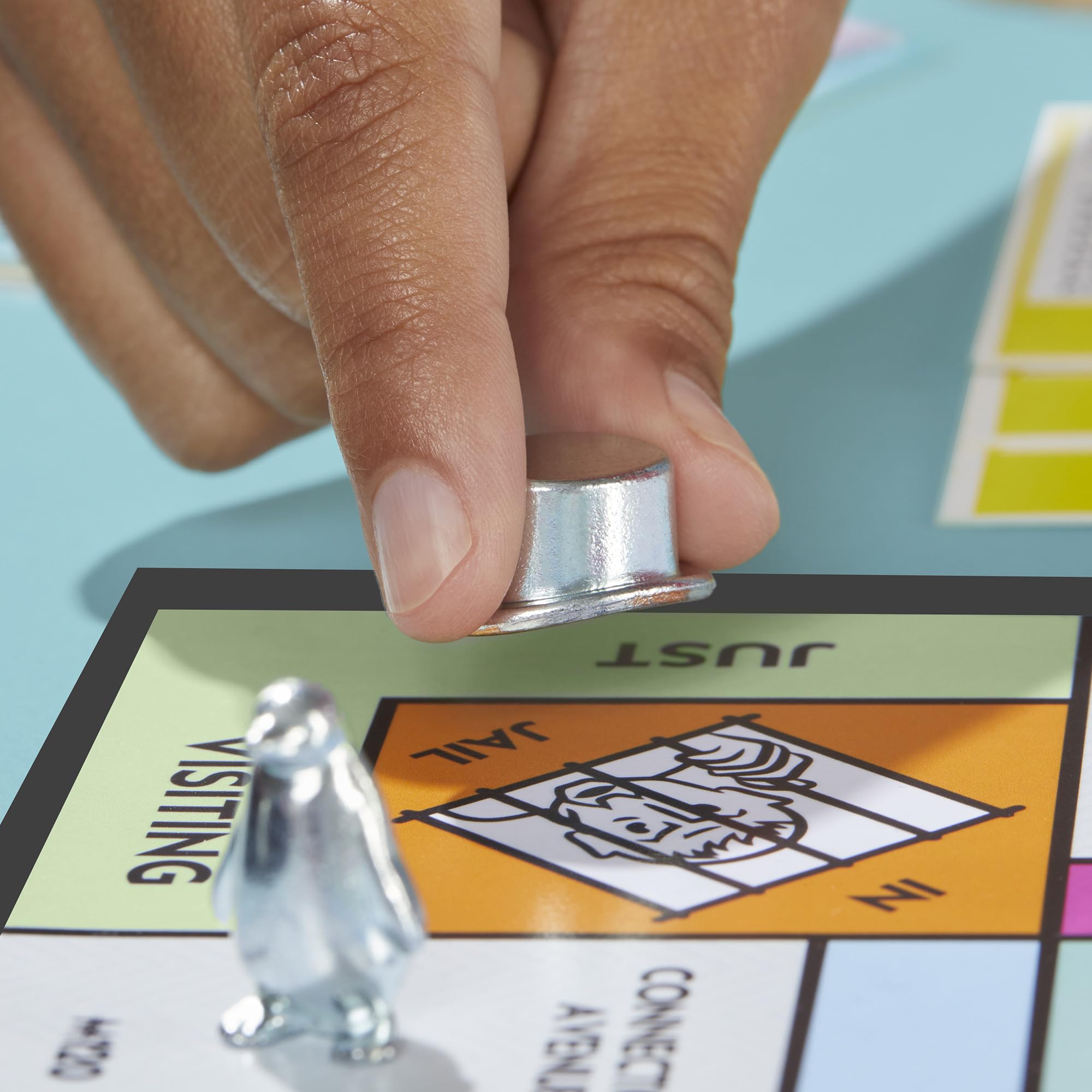 Monopoly banker tray close-up shows sturdy storage for game cash.