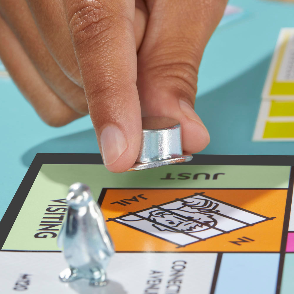 Monopoly banker tray close-up shows sturdy storage for game cash.