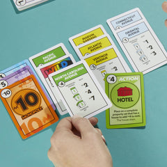 Monopoly Deal action cards add tricks and deals to rounds