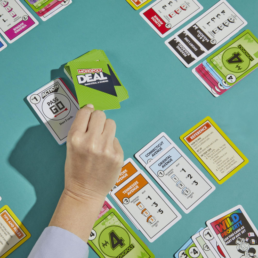 Monopoly Deal card game quick play banner emphasizes 15-minute sessions.