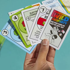 Monopoly Deal card game wild cards show flexible property options for combos.
