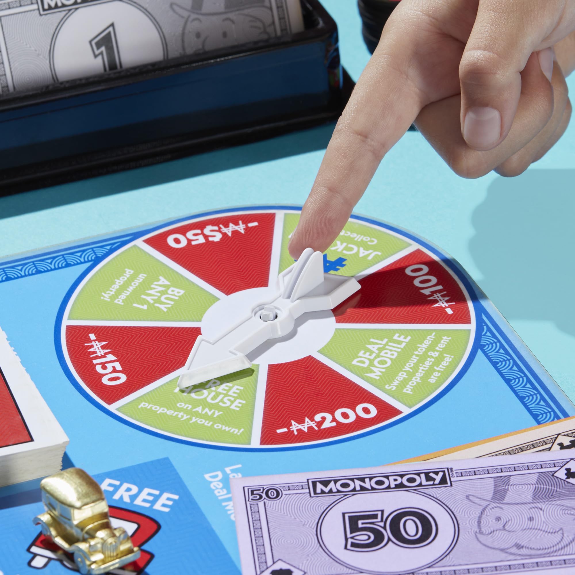 Monopoly Free Parking Jackpot Expansion Deal Mobile token shown for upgrades.