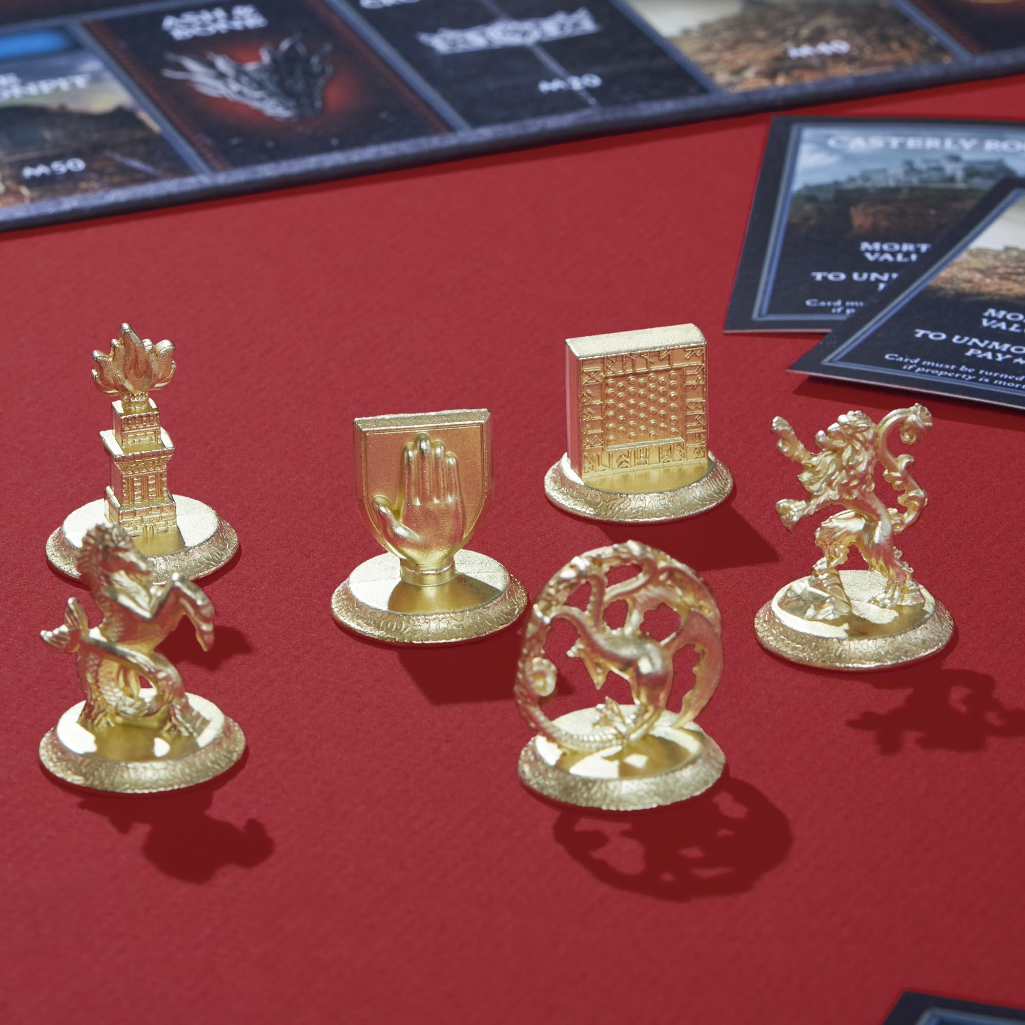 Themed coins track costs and rent for a tangible economy.