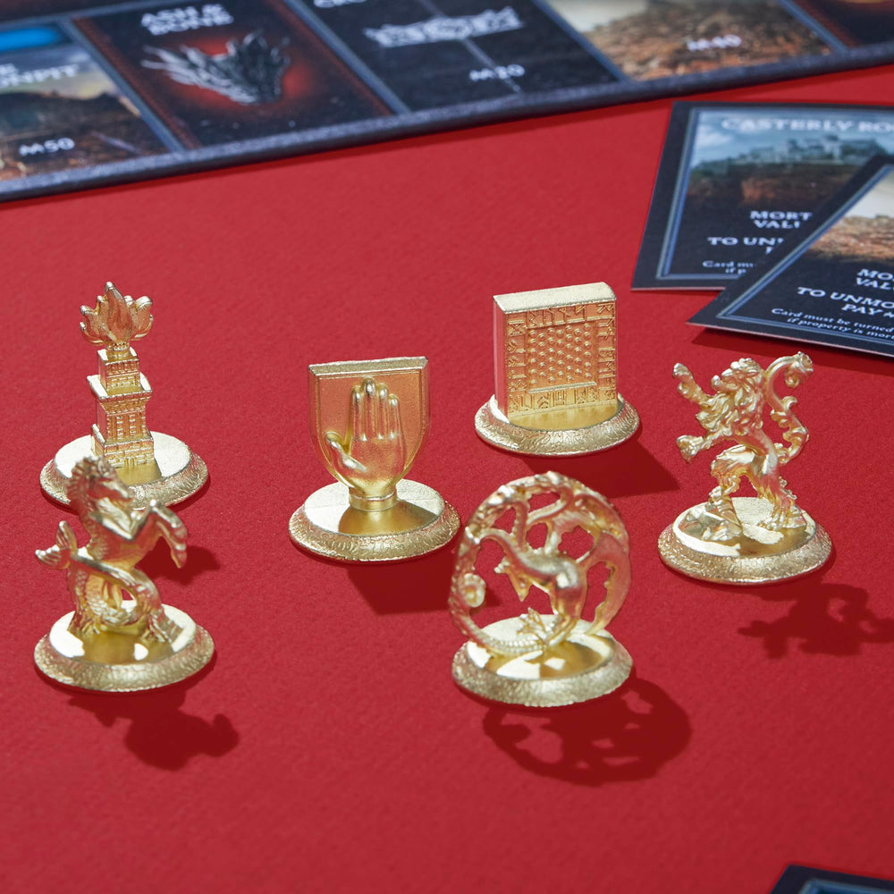 Themed coins track costs and rent for a tangible economy.