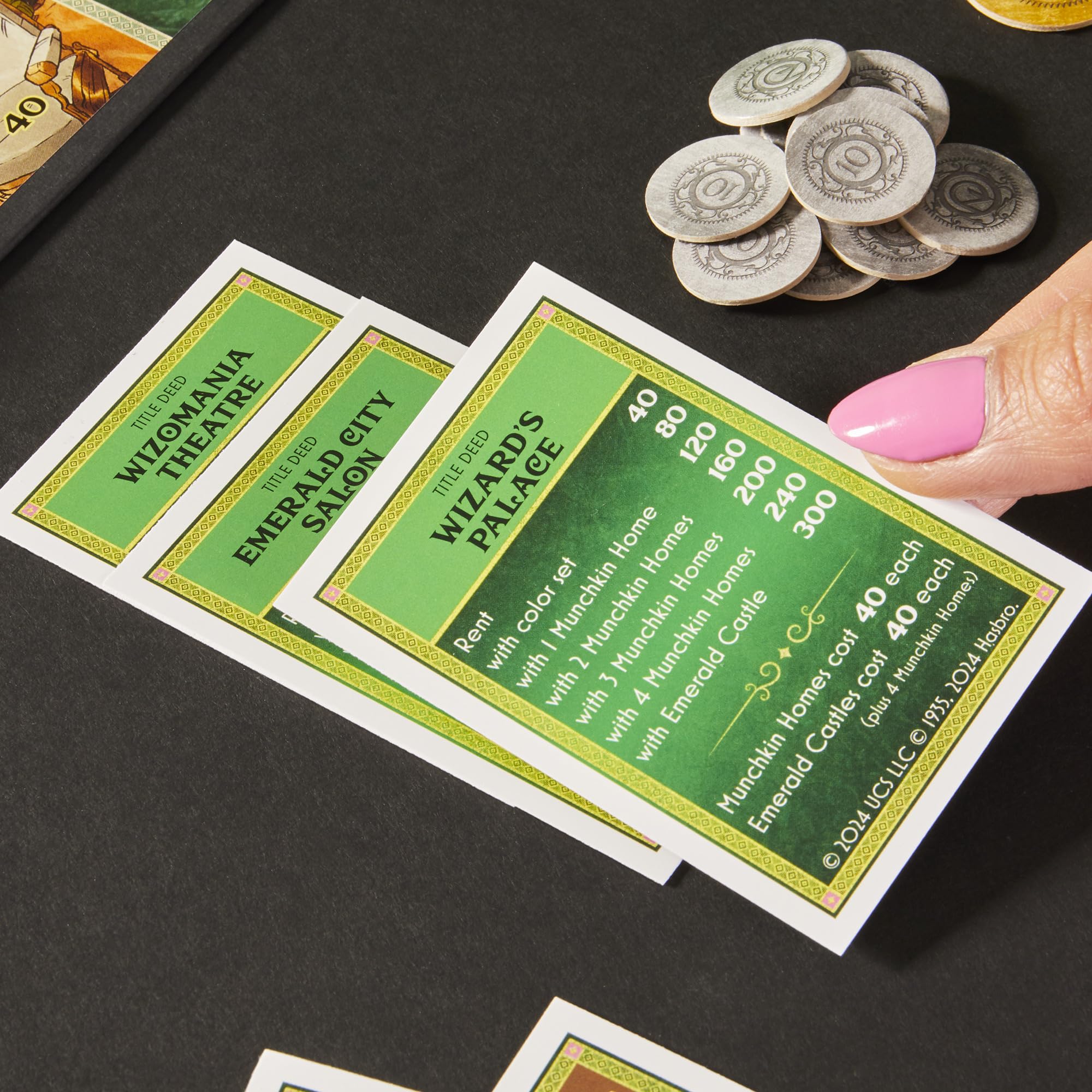 Monopoly Wicked Edition emerald castles space features property choices.