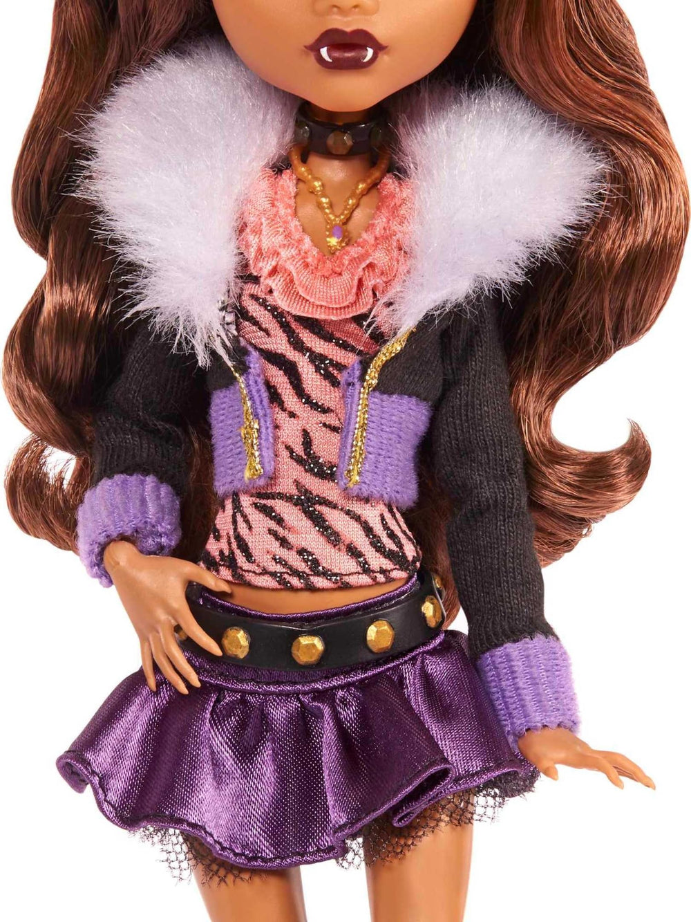 Doll with black jacket, faux fur collar and boots for authentic look.