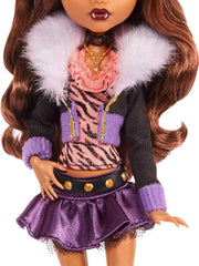 Doll with black jacket, faux fur collar and boots for authentic look.